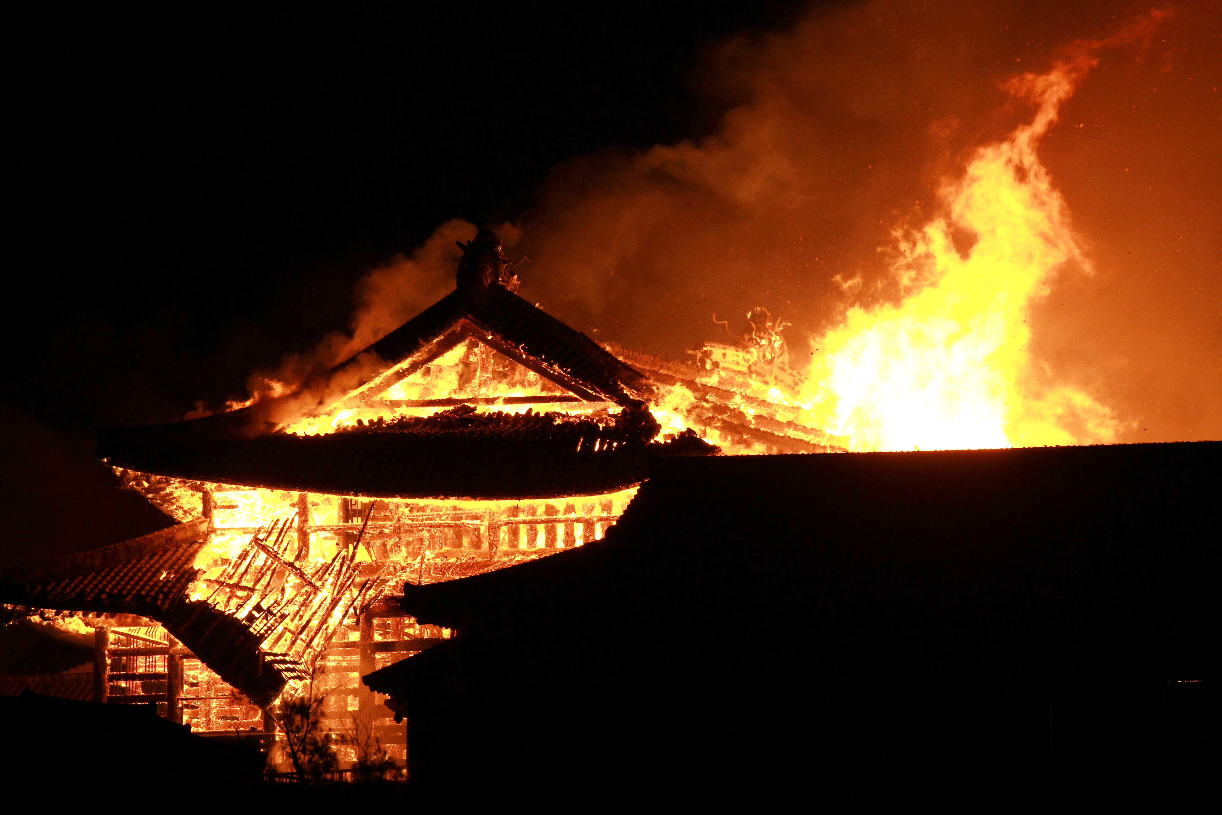 Fire engulfs Shuri Castle.